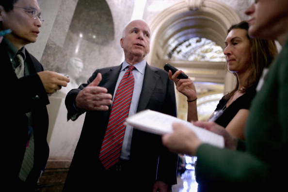Sen. John McCain (R-AZ) talks with reporters after the Senate voted 52-48 to invoke the so-called 'nuclear option. (Chip Somodevilla/Getty Images)