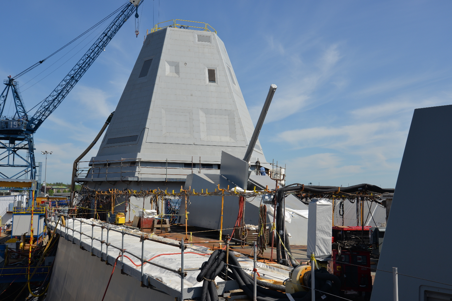 The bridge windows are more visible here. Note the many recesses in the superstructure for radars and sensors. 