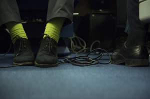 Some lime green socks are the choice for an eight-hour flight to Poland. (Sgt. Aaron Hostutler/DoD)