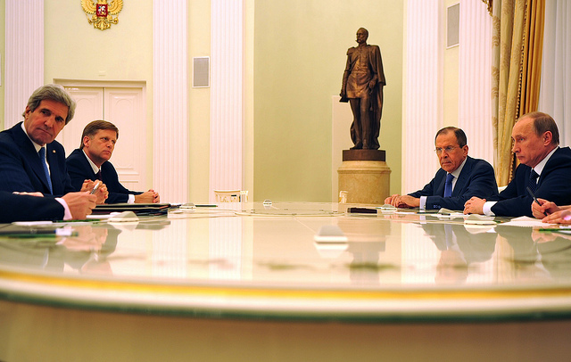 Then-US Ambassador to Russia Michael McFaul (far left) and US Secretary of State John Kerry meet with Russian President Vladimir Putin (far right) and Russian Foreign Minister Sergey Lavrov in Moscow on May 7, 2013. (US State Department photo via Flickr)