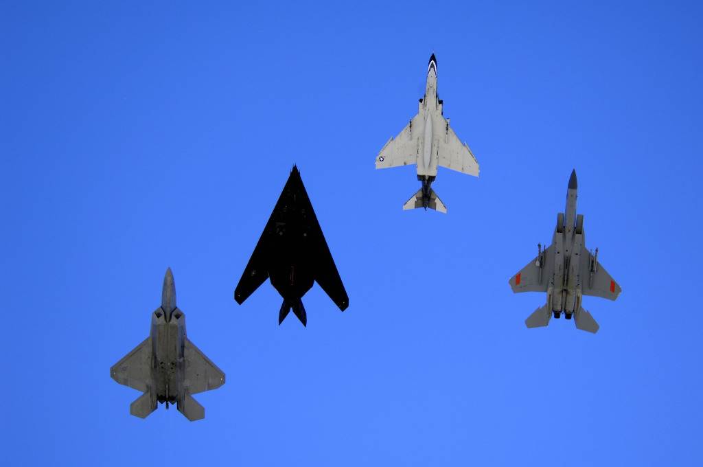 An F-22 Raptor, an F-117 Nighthawk, an F-4 Phantom and an F-15 Eagle fly over Holloman Air Force Base, N.M. Oct. 27 during the Holloman Air and Space Expo. (Air Force)