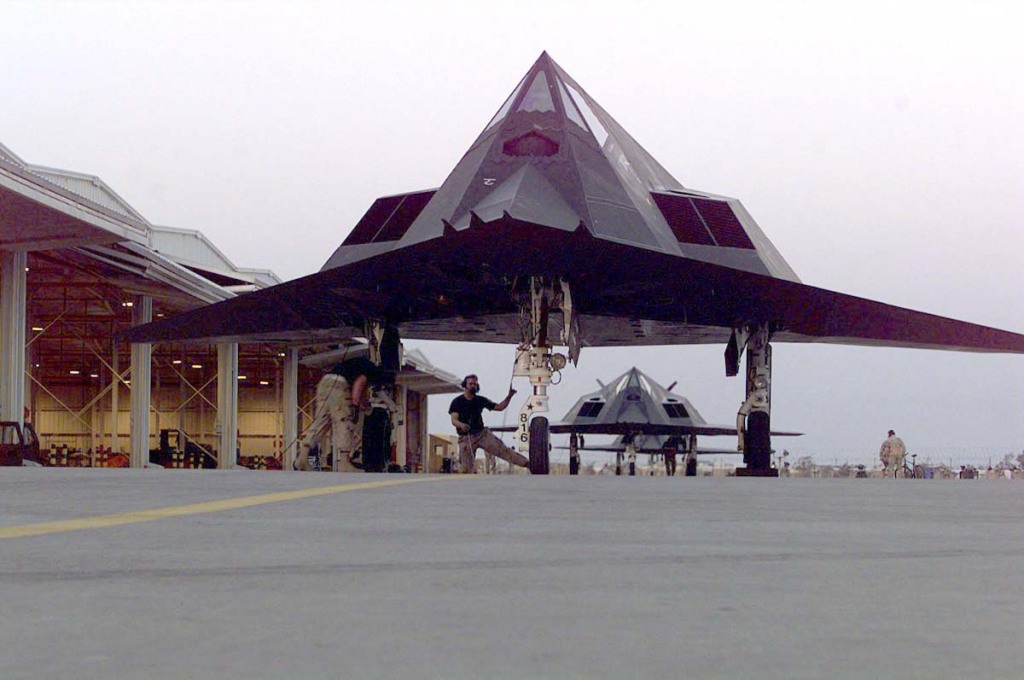  F-117 Nighthawks belonging to the 8th Fighter Squadron, 49th Fighter Wing, Holloman Air Force Base, New Mexico, are being prepared for a mission  on March 15, 1998. (Air Force)