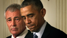 President Barack Obama (R) speaks as Secretary of Defense Chuck Hagel looks on during a press conference announcing Hagel's resignation in the State Dining Room of the White House on Monday. (Alex Wong/Getty Images)